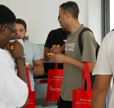 Ascencia Malta staff welcoming new international students with orientation gifts and refreshments